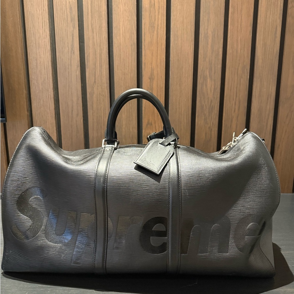 Louis Vuitton x Supreme Keepall Bandoulière 55 – Black Epi Leather